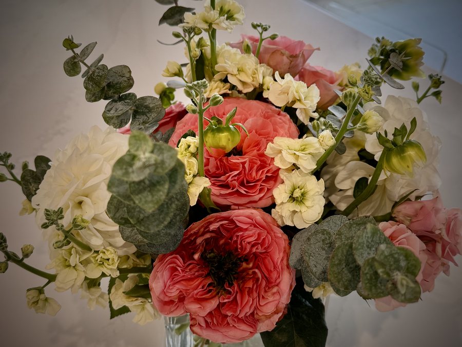 Anniversary arrangement — lush coral garden roses