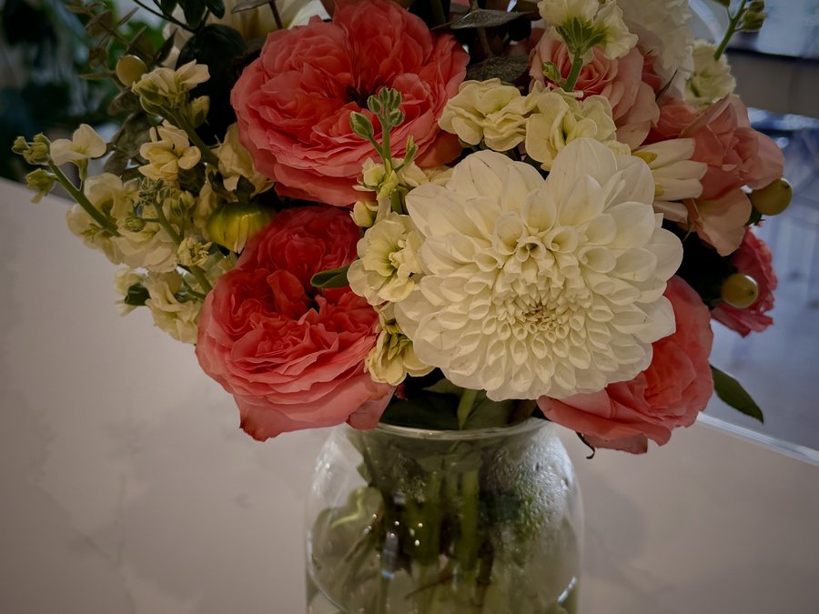 Birthday arrangement — bright, joyful seasonal blooms